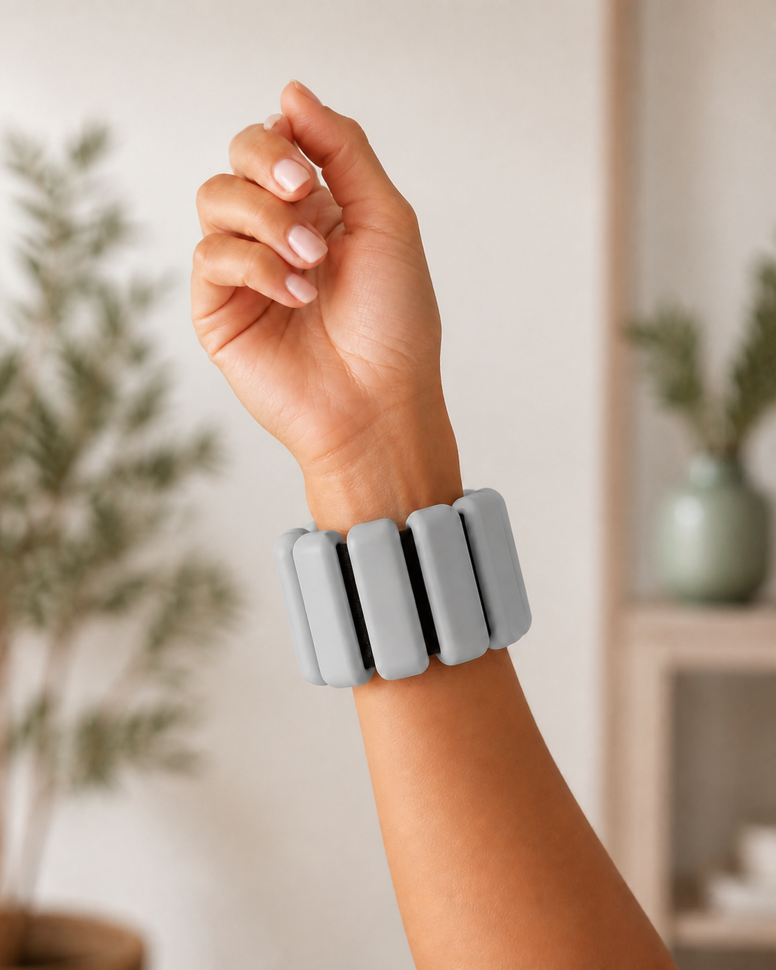 Grey soft weighted wrist band worn