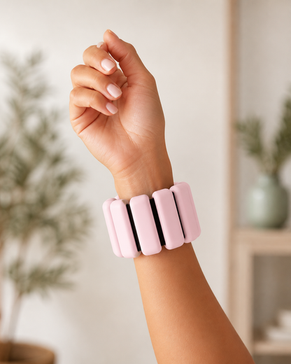 Pink soft weighted wrist band worn